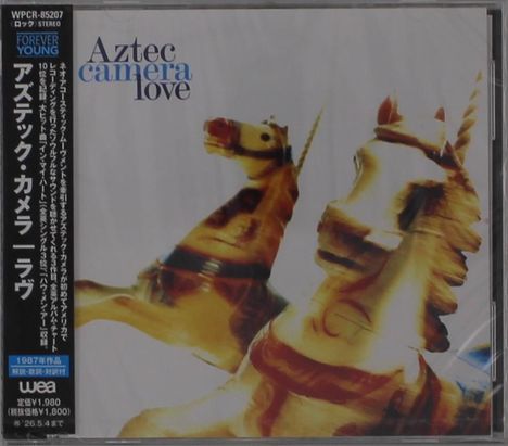 Texte: "Aztec Camera Love", "FOREVER YOUNG", "1987年作品 wew ¥1,980". Zwei verschwommene Karussellpferde.
