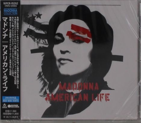 "Madonna American Life" in roten Buchstaben. Schwarz-weißes Porträt mit rotem Streifen über den Augen. Japanischer Text links.