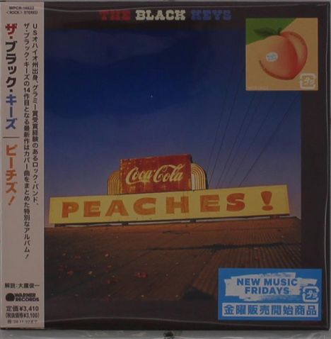"The Black Keys", "PEACHES!", japanische Zeichen links, "New Music Fridays". Ein Foto mit einem Peaches-Schild.