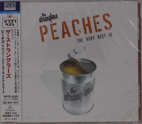 "Peaches: The Very Best Of" steht oben. Darunter eine geöffnete, silberne Dose mit Pfirsichen. Links sind japanische Schriftzeichen.