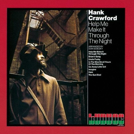 Text: Hank Crawford, Help Me Make It Through The Night. Arrangement: Don Sebesky. Unten ein farbiges Logo. Stilvolles Porträt eines Mannes mit Hut in einem Gebäude.