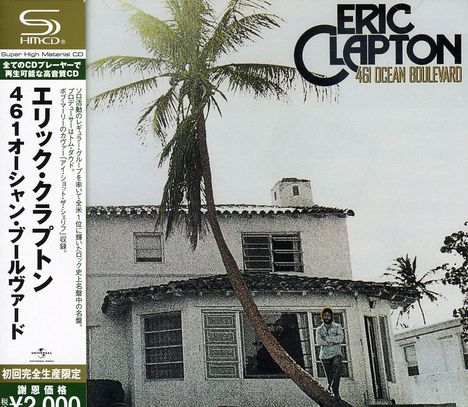 「Eric Clapton 461 Ocean Boulevard」. Ein Haus mit Palmen und eine Person, die davor steht. Japanischer Text links.