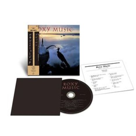 "Roxy Music" oben auf dem Albumcover. CD, Infozettel und ein schwarzes Quadrat liegen daneben. Cover zeigt eine nächtliche Skyline.