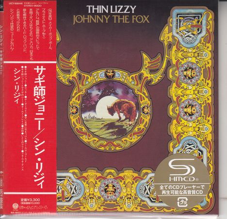 "THIN LIZZY", "JOHNNY THE FOX". Illustration mit zentralem Motiv eines Fuchses vor Mondlandschaft. Japanischer Text links.