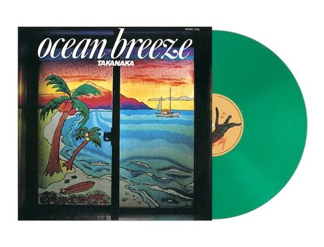 Texte: "ocean breeze" und "TAKANAKA". Grüne Vinyl-Schallplatte mit Cover-Illustration eines Strandes und Segelbootes.
