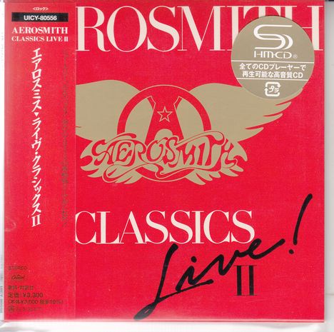"AEROSMITH CLASSICS LIVE II". Rotes Cover mit goldfarbenem Logo. Japanische Schriftzeichen links, Hochglanz-Aufkleber oben rechts.