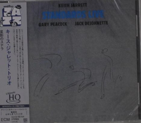 "STANDARDS LIVE" steht in blauer Schrift, oben Namen in Schwarz. Links sind japanische Schriftzeichen und ein Jazz-Logo.
