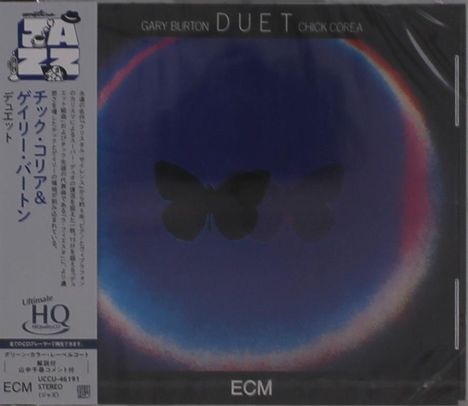 Texte: "GARY BURTON DUET CHICK COREA", "ECM". Grafik mit zwei schwarzen Schmetterlingen auf blauem und buntem Hintergrund.