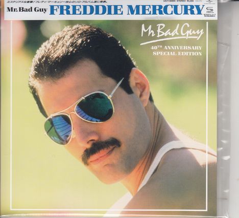 Mr. Bad Guy, Freddie Mercury, 40th Anniversary Special Edition. Eine Person mit Sonnenbrille und Schnurrbart schaut zurück.
