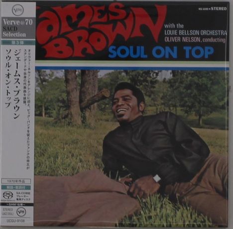 "AMES BROWN SOUL ON TOP" in großen Buchstaben, ein lächelnder Mann auf einer Wiese liegend, im Hintergrund Bäume.