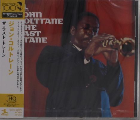 JOHN COLTRANE THE LAST TRAIN. Links vertikale japanische Schrift. Ein Musiker spielt Saxophon vor rotem Hintergrund.