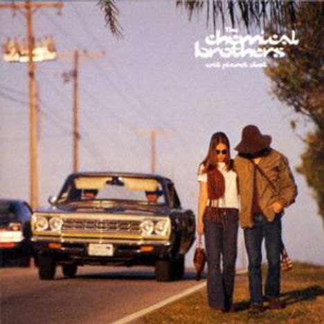 Text oben rechts: "The Chemical Brothers - exit planet dust". Ein Paar läuft auf einer Straße, im Hintergrund ein Auto.