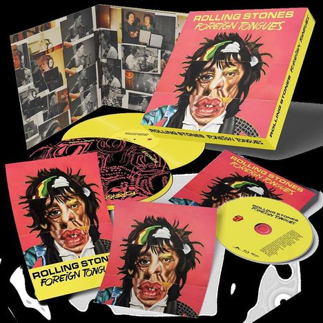 "ROLLING STONES FOREIGN TONGUES" auf roter Verpackung. Cover zeigt verzerrtes Gesicht. Innen schwarz-weiße Studiofotos.
