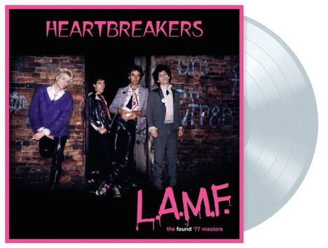 "HEARTBREAKERS" oben in Pink. "L.A.M.F." unten. Vier Personen vor einer Ziegelmauer, Vinylschallplatte daneben.