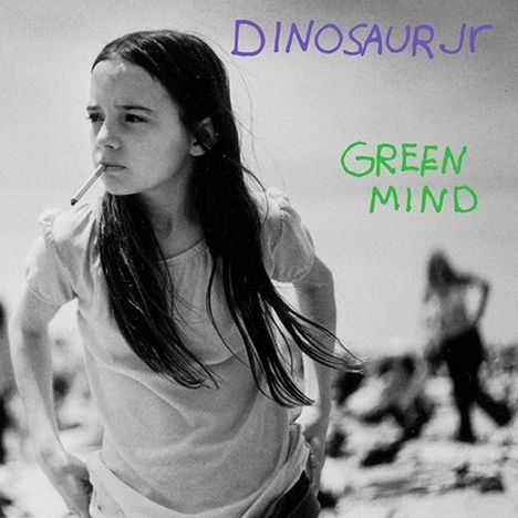 Text: "DINOSAUR JR" in Lila, "GREEN MIND" in Grün. Ein Mädchen mit Zigarette im Mund schaut entschlossen.