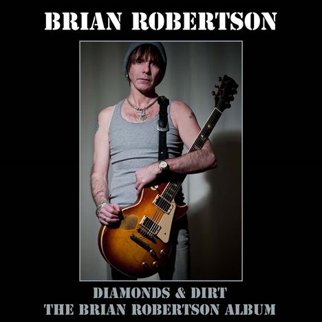BRIAN ROBERTSON, DIAMONDS & DIRT, THE BRIAN ROBERTSON ALBUM. Ein Mann mit Gitarre, grauem Tanktop und Mütze.