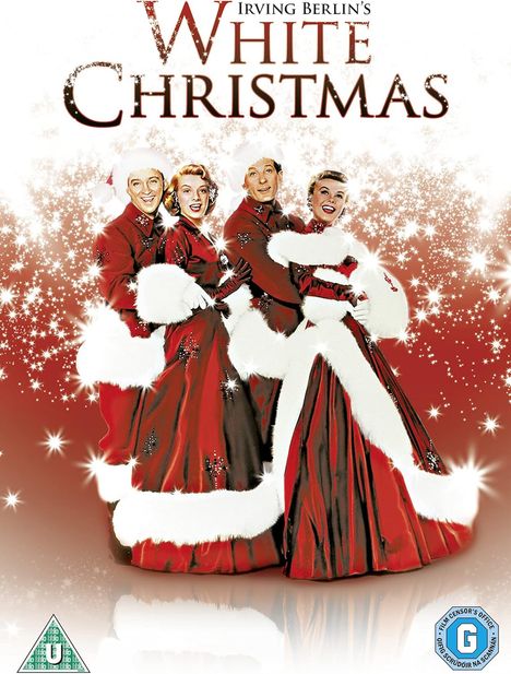 „Irving Berlin’s White Christmas“. Vier Personen in roten Kostümen mit weißem Pelzbesatz stehen lächelnd vor funkelndem Hintergrund.
