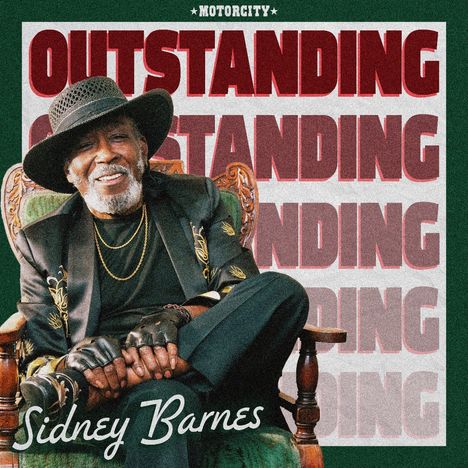 „OUTSTANDING“ und „Sidney Barnes“. Ein Mann in einem eleganten Outfit sitzt lächelnd in einem Sessel.