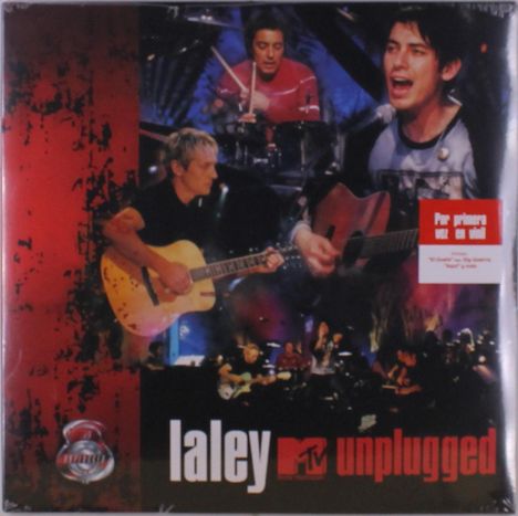 "laley MTv unplugged", darunter spielt eine Band. Gitarrist und Schlagzeuger sichtbar. Atmosphäre von Live-Auftritt.