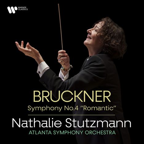 "Bruckner Symphony No.4 'Romantic'; Nathalie Stutzmann; Atlanta Symphony Orchestra." Dirigentin mit erhobenen Armen.