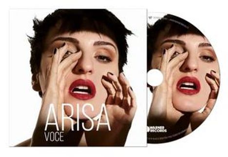 Texte: "ARISA", "VOCE". Eine Frau mit roten Lippen berührt ihr Gesicht vor weißem Hintergrund auf einem CD-Cover.