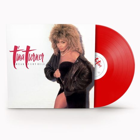 Albumcover-Text: "Tina Turner, Break Every Rule". Eine Frau mit voluminösem Haar und Lederjacke neben einer roten Schallplatte.