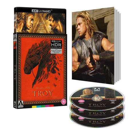 Text: "Troy", "4K Ultra HD", "HDR". Eine Filmsammlung mit rotem Cover, Kriegerabbild und drei Discs.