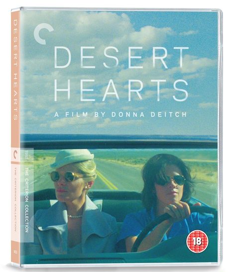 "DESERT HEARTS", Film von Donna Deitch. Zwei Frauen in einem Auto, fahren auf einer offenen Straße.