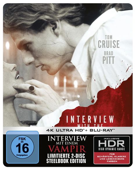 "Interview mit einem Vampir", Tom Cruise, Brad Pitt. Zwei Männer, einer hält den anderen am Hals. FSK 16 auf blauem Kreis.