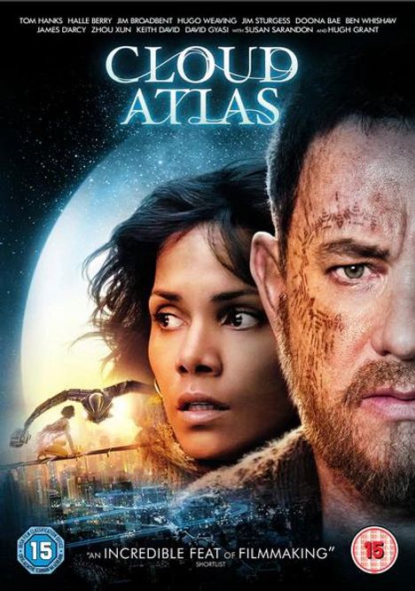 „Cloud Atlas“ steht oben. Zwei ernste Gesichter im Vordergrund, futuristische Stadt und Himmel im Hintergrund.