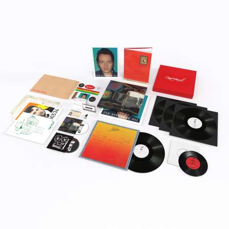 Joe Strummer: Joe Strummer 001 (Super-Deluxe-Boxset), 3 LPs, 1 Single 12", 1 Single 7", 2 CDs, 1 MC und 1 Buch