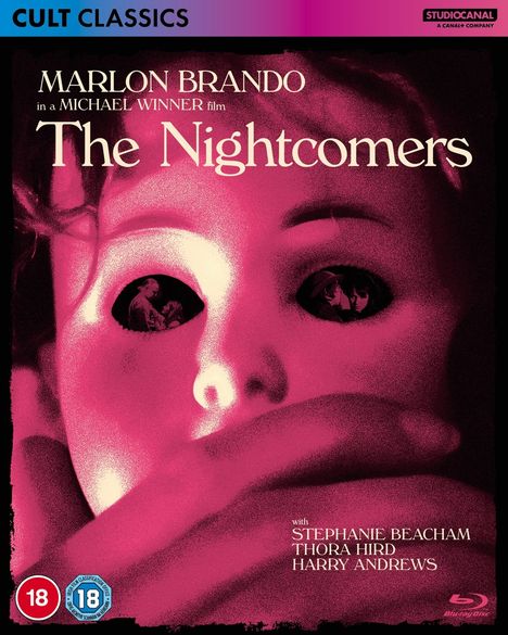 „The Nightcomers“ steht im Vordergrund. Ein gezeichnetes Gesicht schaut erschrocken. Schatten verdecken die Details.