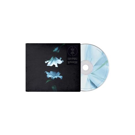 Text: Wasa Project, Nocturne. Schwarzes Cover mit weißen Lilien, daneben eine CD mit bläulichen Mustern.