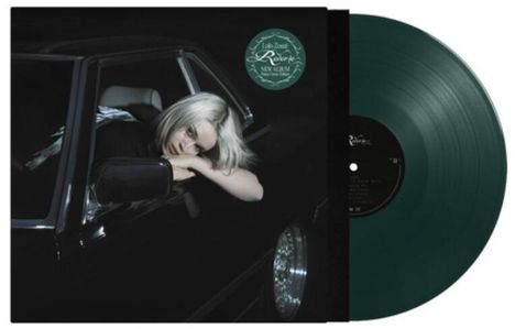 "New Album" in einem grünen Kreis. Eine Person mit blonden Haaren lehnt aus einem Autofenster. Links eine schwarze Schallplatte.