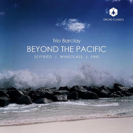 "Trio Barclay: BEYOND THE PACIFIC. Seyfried | Wineglass | Fine." Brandung trifft auf Felsen, blauer Himmel, Logo oben rechts.