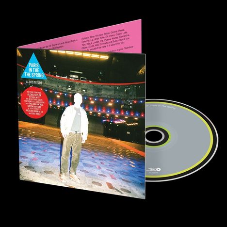 Text: "Paris in the Spring", "Alexis Taylor". Eine Person steht in einer farbenfrohen, beleuchteten Umgebung auf einem Albumcover.