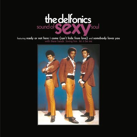 Text: "the delfonics sound of sexy soul." Drei Männer in braunen Anzügen vor blauem Hintergrund, posierend.