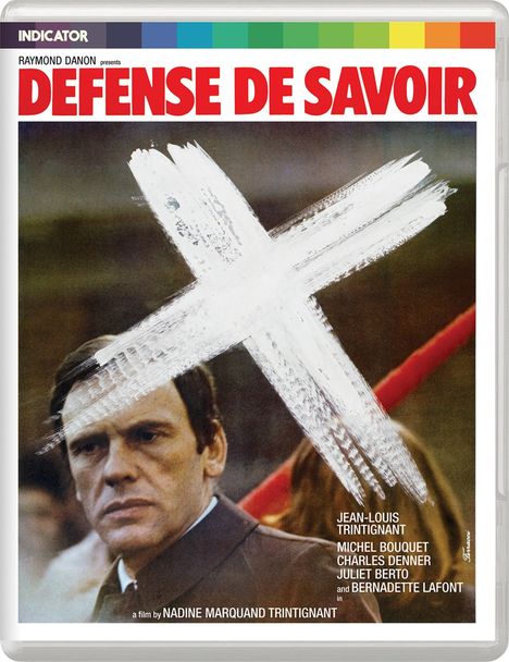 Filmplakat mit rotem Text "DEFENSE DE SAVOIR". Großes weißes gemaltes X über einem ernst blickenden Mann.