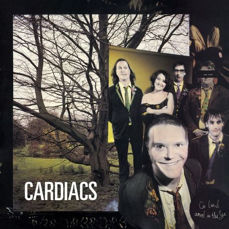 Text: "CARDIACS" und "On land and in the sea". Eine Gruppe von Menschen in formeller Kleidung vor einem kahlen Baum.