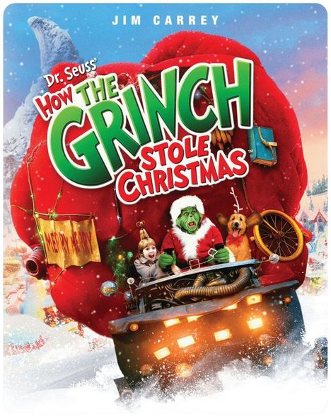 "Dr. Seuss’ How the Grinch Stole Christmas". Grinch in Weihnachtsmann-Kostüm fährt mit Kind und Hund im Schnee.