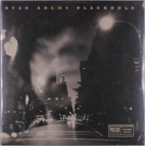Oben steht "RYAN ADAMS BLACKHOLE". Eine verschwommene nächtliche Stadtansicht mit Lichtern und Schatten.