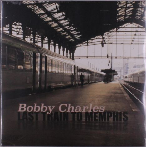 "Bobby Charles" und "Last Train to Memphis" in kräftigen Buchstaben. Ein Bahnhof mit Zügen und einem überdachten Bahnsteig.