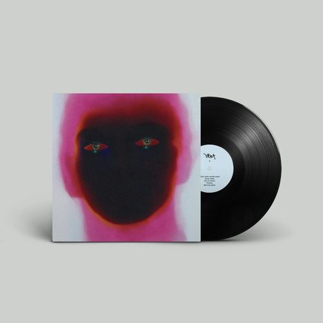 Vinyl mit Cover. Texte: "These are the words cast of iron gaze...", daneben abstraktes Gesicht mit dunklem Zentrum und roten Augen.