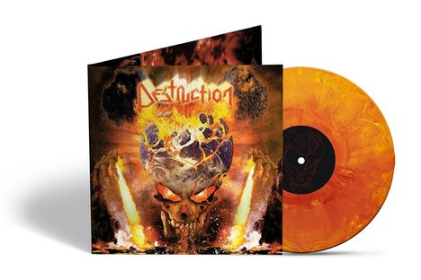 Text: "Destruction". Ein Cover mit brennendem Schädel und Vulkanen. Orange-gelbe Schallplatte daneben.