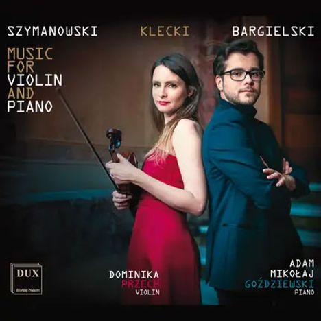 Szymanowski, Klecki, Bargielski; Music for Violin and Piano. Dominika Przech und Adam Goździewski in eleganter Kleidung.