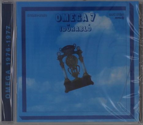 OMEGA 7 IDŐRABLÓ, OMEGA 1976-1977. Blaue Wolken, antike Uhr in der Mitte, klare Hülle.