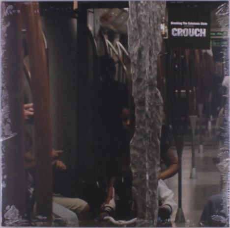 Texte: "Breaking The Catatonic State" und "CROUCH". Szenerie: Menschen in einem Zug oder U-Bahn.