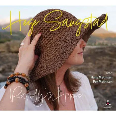 "Hege Saugstad", "Randy's Home", "feat. Hans Mathisen, Per Mathisen". Frau mit Hut im Freien, schaut zur Seite.