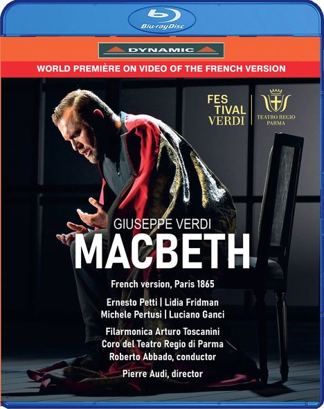 "World Première on Video of the French Version", "Giuseppe Verdi Macbeth", Mann in rotem Umhang in nachdenklicher Pose.