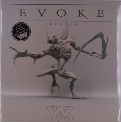 "EVOKE" und "PROVOKE" sind oben, "WUMPSCUT" unten. Eine monströse Kreatur mit langen Gliedmaßen dominiert die Mitte.